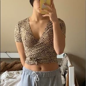 cropped cheetah print wrap around brandy melville shirt